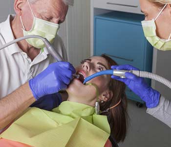 Guest gets a amalgam removal treatment at dentist